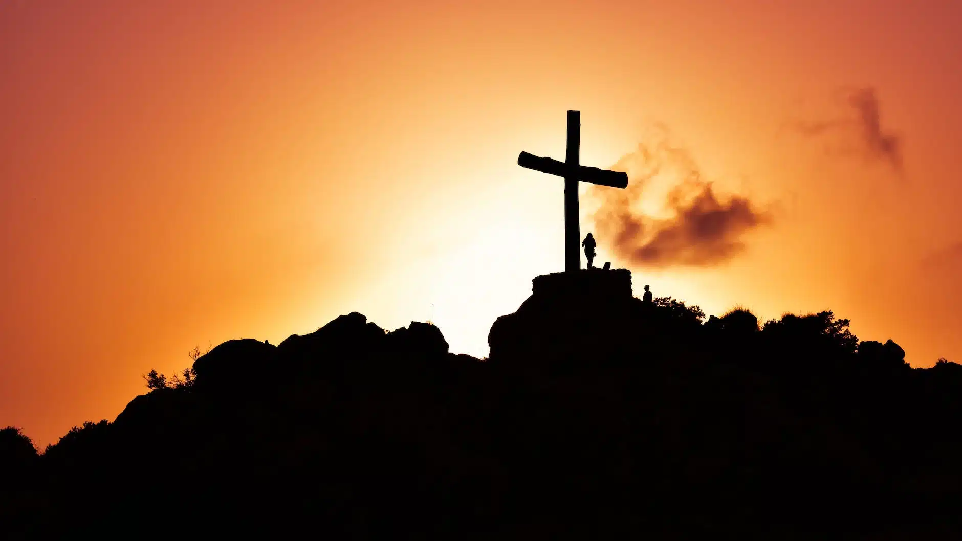 human standing beside crucifix statue on mountain - Do You Realize What Jesus Did For You?