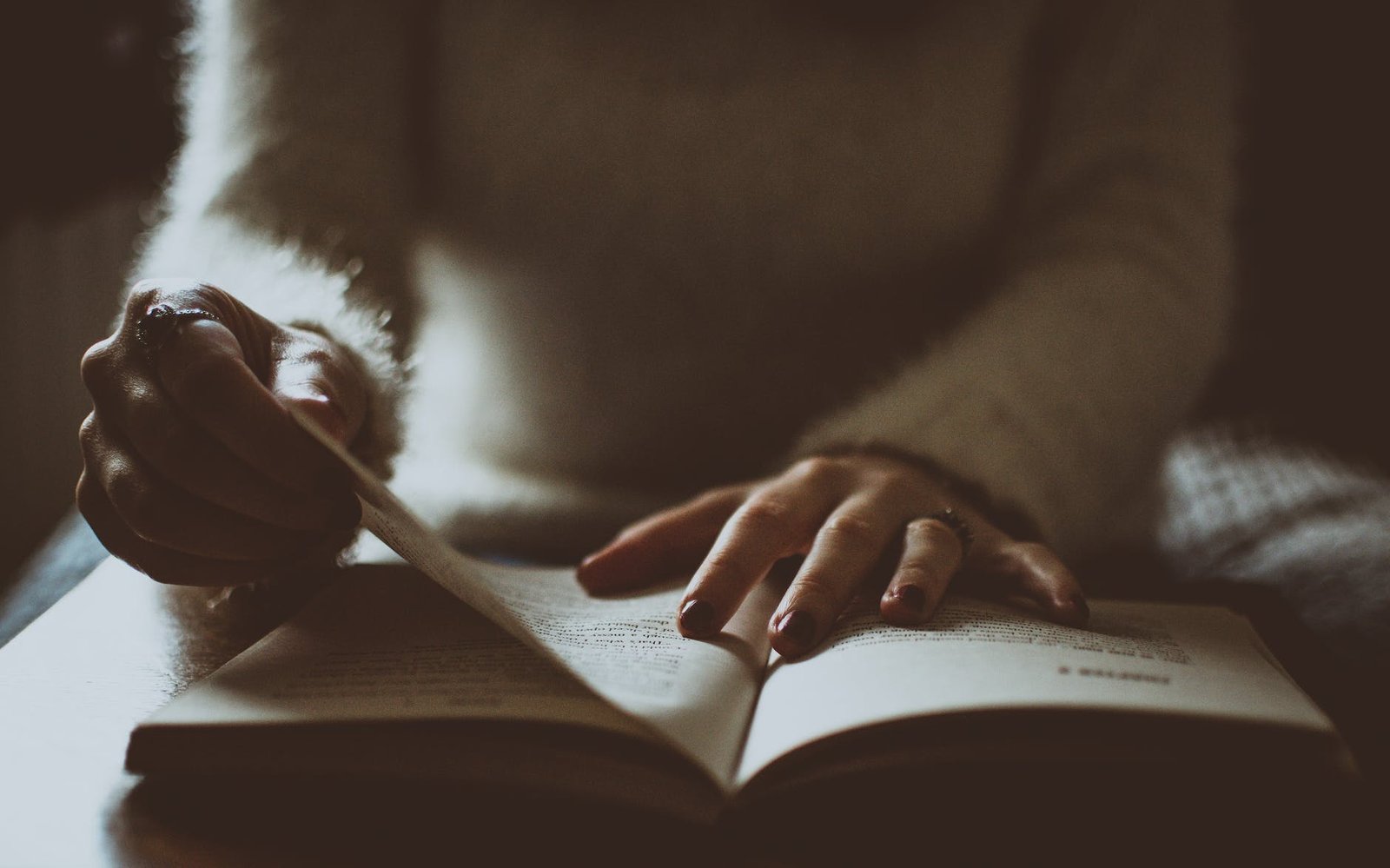 Girl doing Bible study - faith comes by hearing the Word of God.