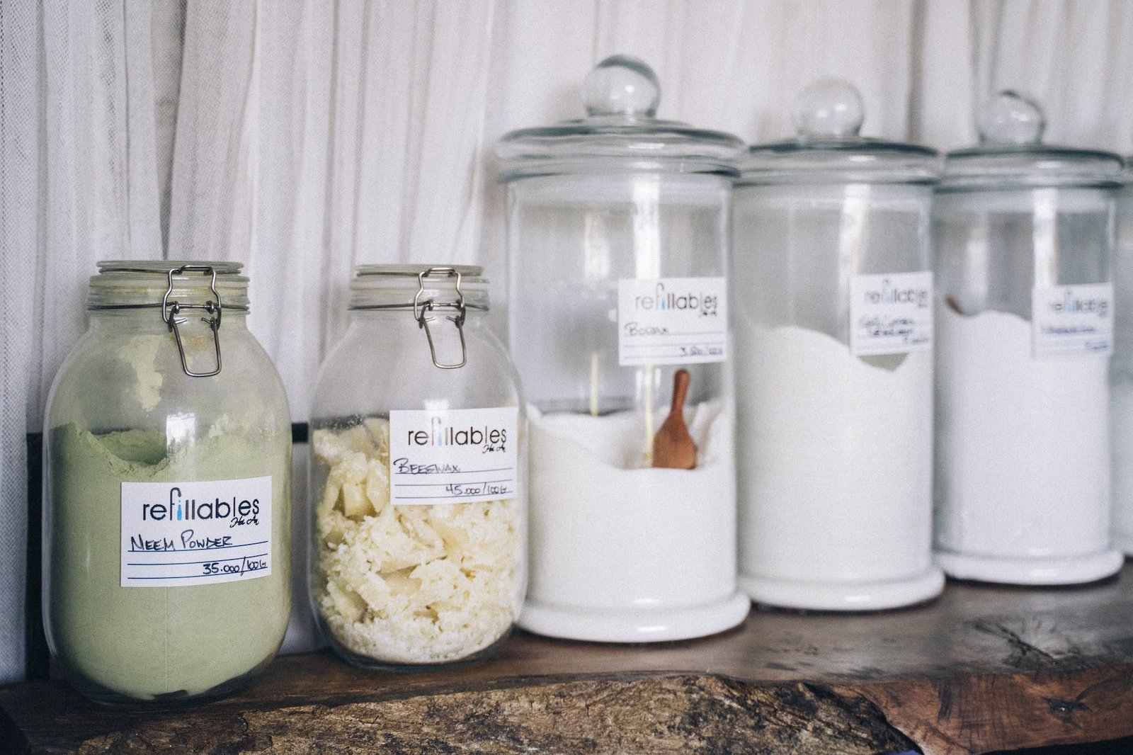 assorted powders in glass jars