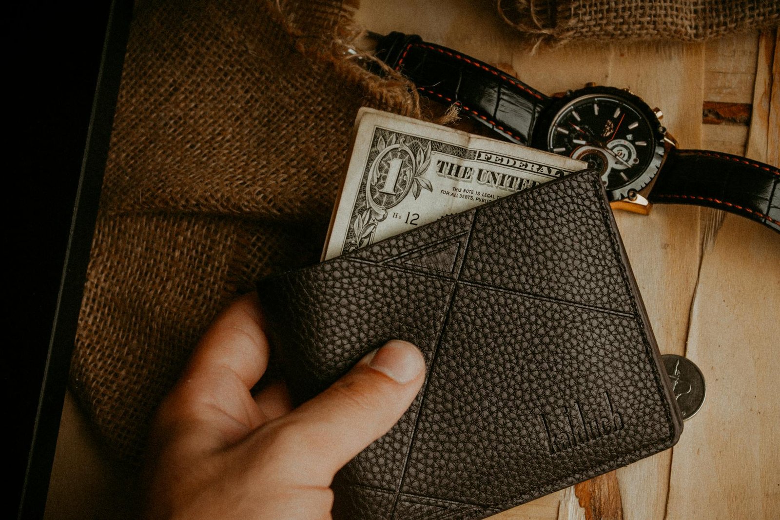 man holding wallet