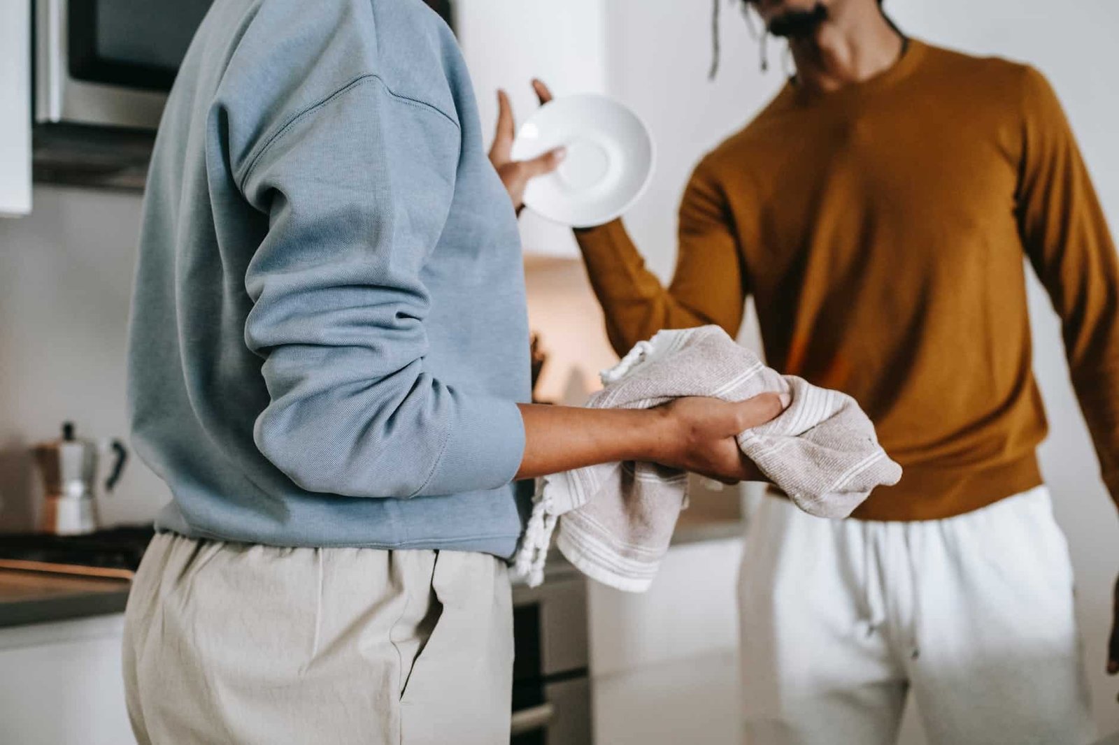 anonymous black lady and guy arguing in kitchen