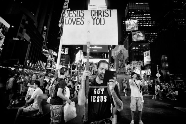 people with placards protesting in city downtown