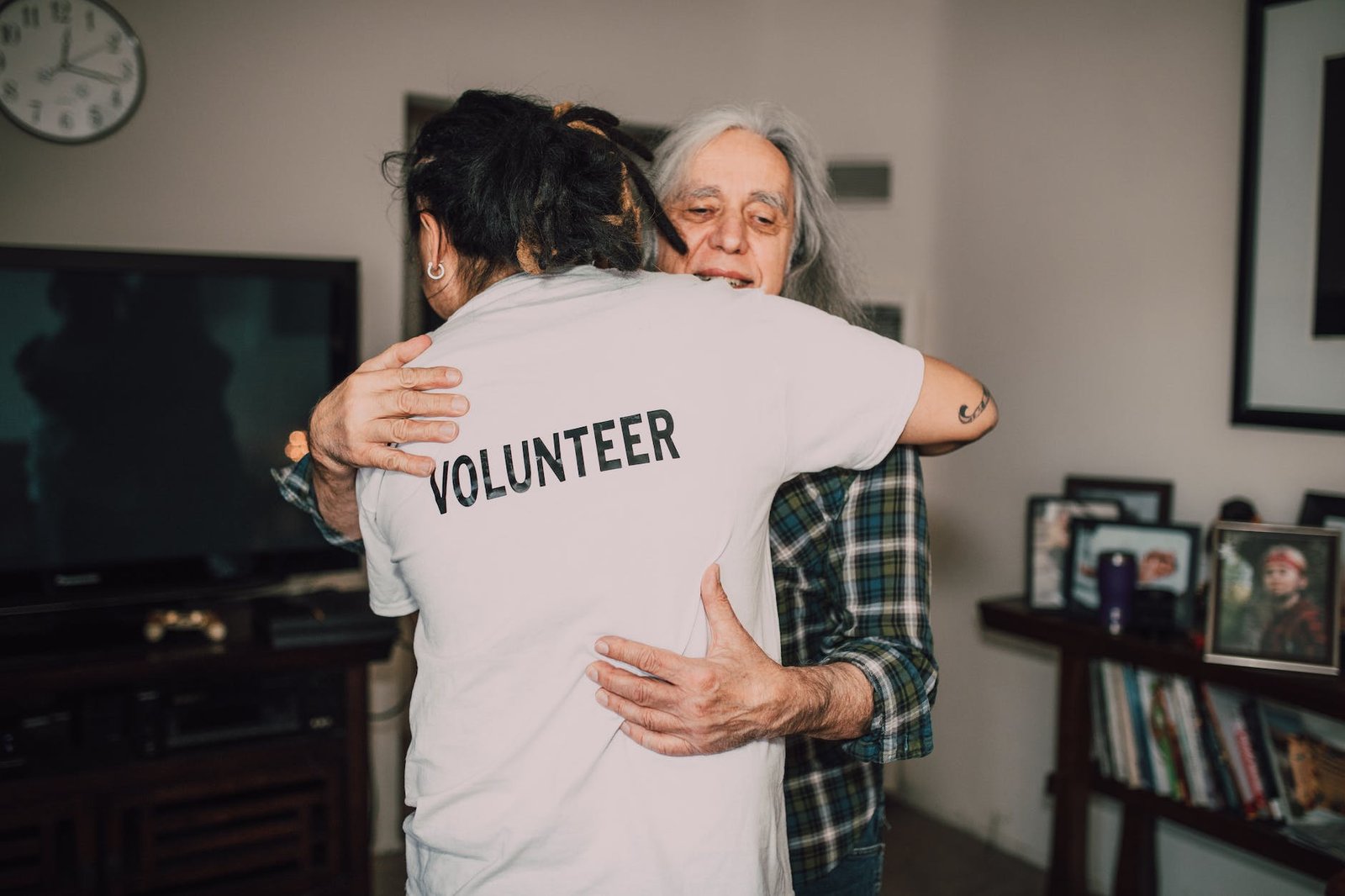 two people hugging each other