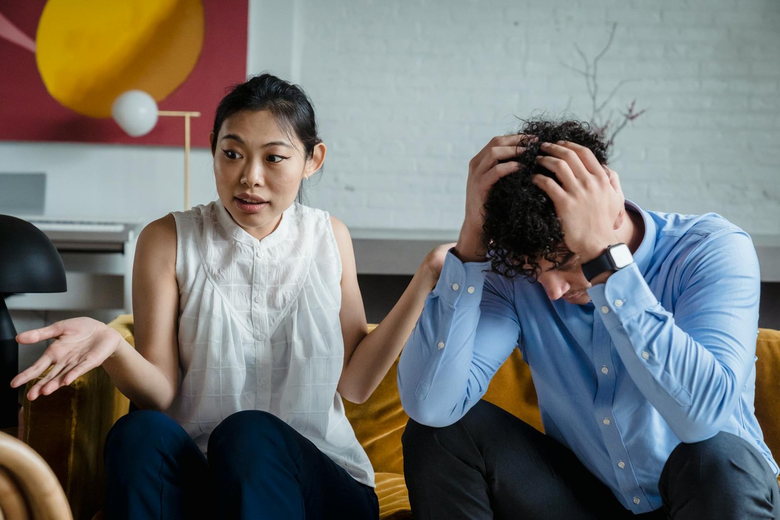 a couple sitting while arguing