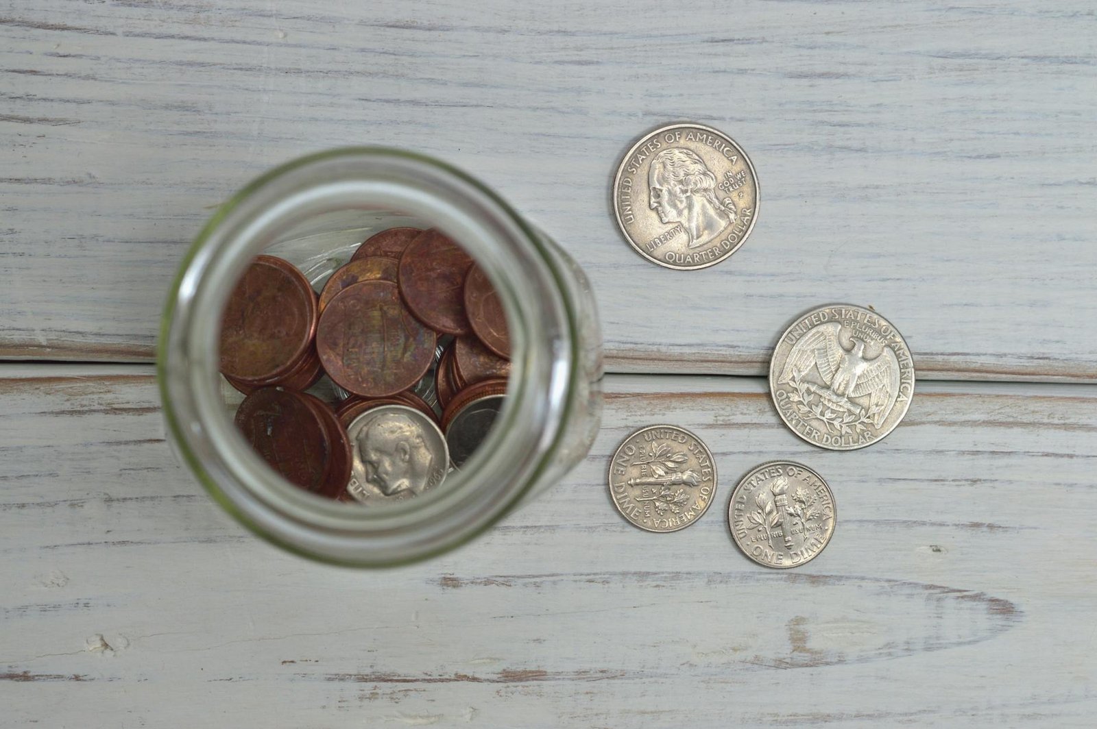 coins inside jar