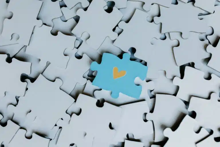 heart shape on a blue puzzle piece
