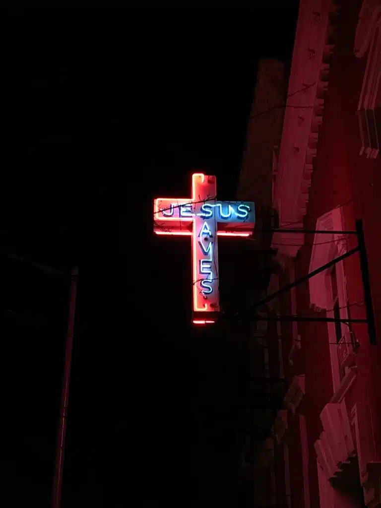 jesus saves neon signage