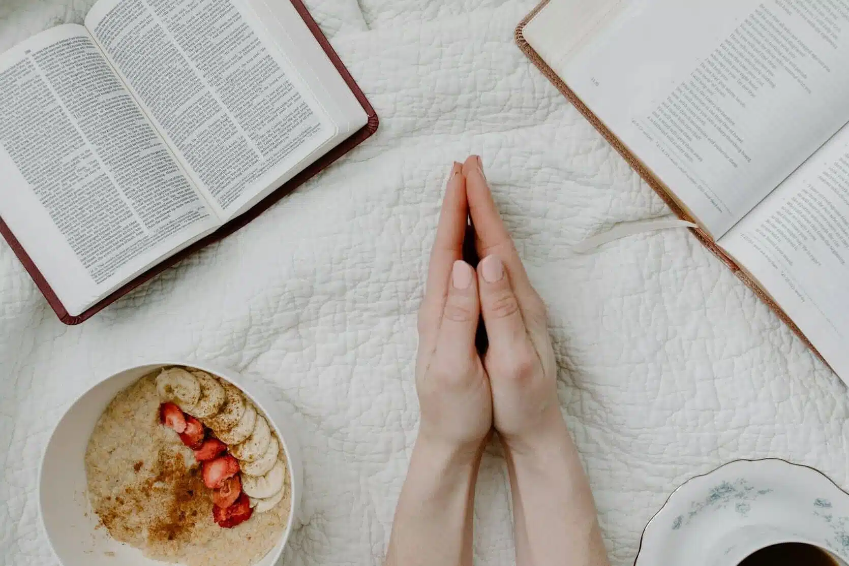 person holding white ceramic plate with food