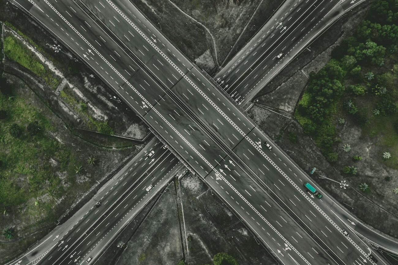 aerial photo of gray concrete road