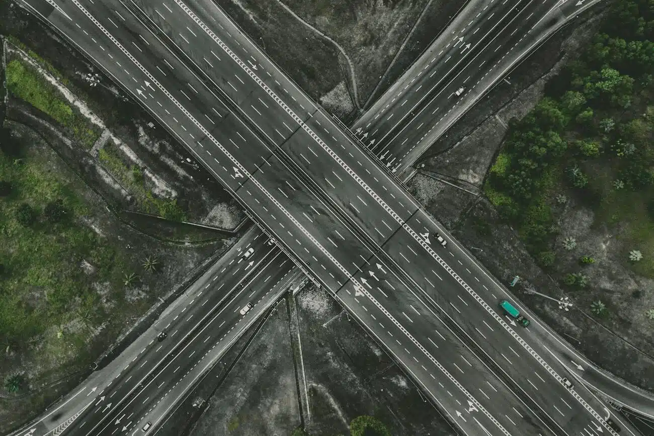 aerial photo of gray concrete road