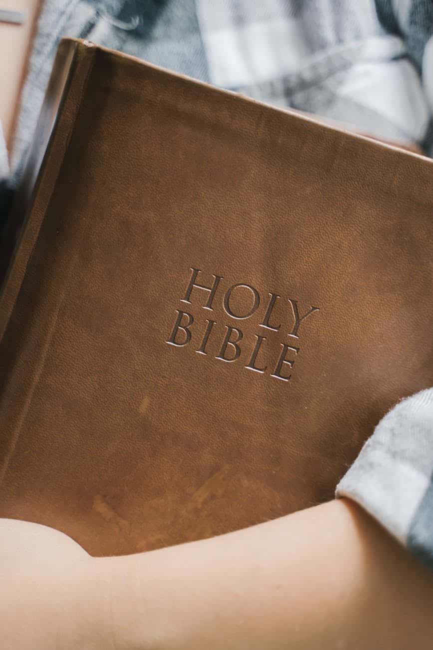 a person holding a bible